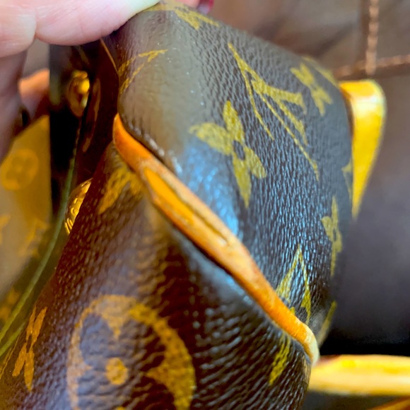 Authentic Louis Vuitton Tivoli with dust bag. - Picture 7 of 12
